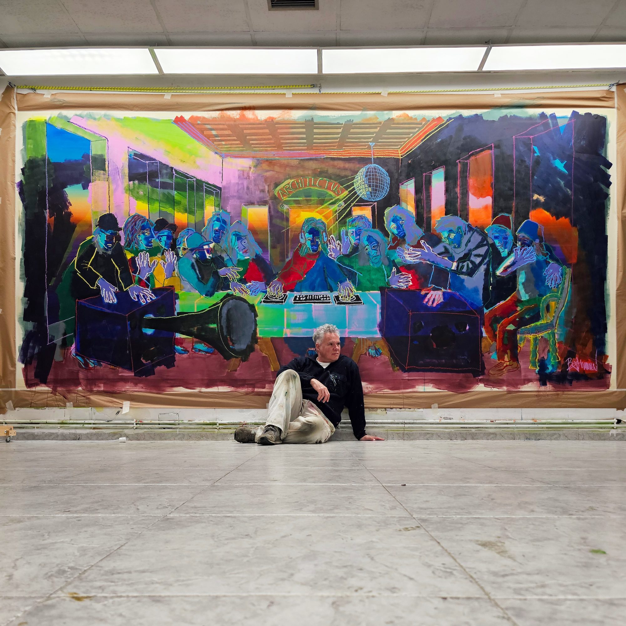 Claus Bertermann sitting in front of his monumental figurative painting The Last Song 2026