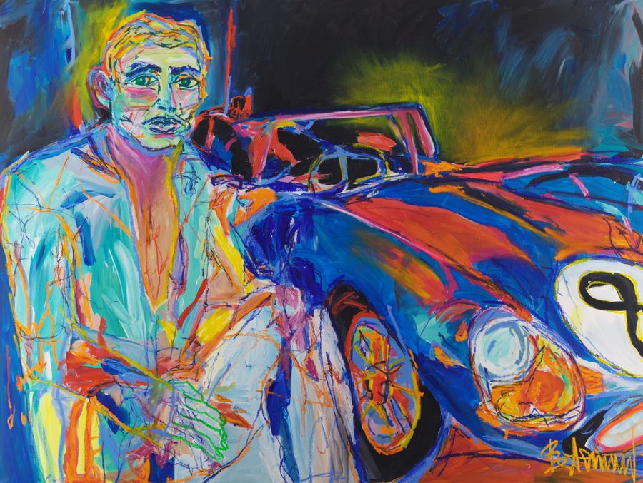 No Halo (2026) by Claus Bertermann — a fair-haired racing driver in a turquoise open-necked shirt with green eyes and a green-drawn hand sits beside a low blue and vermilion 1960s racing car with a spoked wheel, round headlight and a white roundel bearing the number 8, beneath an ochre glow in a black night sky. 150 × 200 cm. Hand-painted, no AI.